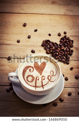  coffee/ love cup , heart drawing on latte art coffee  stock photo