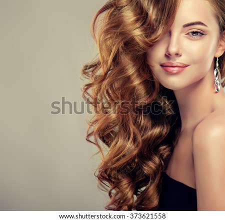 http://thumb1.shutterstock.com/display_pic_with_logo/1054231/373621558/stock-photo-beautiful-girl-with-long-wavy-hair-brunette-model-with-curly-hairstyle-373621558.jpg
