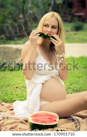 stock-photo-elegant-pregnant-blonde-youn