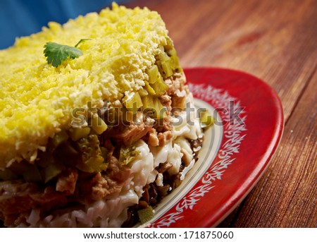 delicious salad with cod liver tuna fish isolated on white