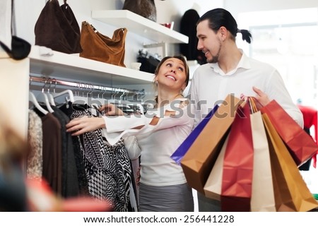 People,Beauty,Black Hair,Bonding,Boutique,Bright Colour,Carrying,Clothes Shop,Coathanger,Colour Image,Consumerism,Couple - Relationship,Customer,Cute