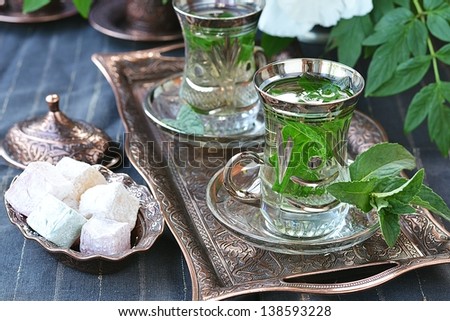 Про стоки mint tea with Turkish delight - stock photo