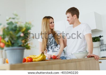 http://thumb1.shutterstock.com/display_pic_with_logo/1340284/401040220/stock-photo-man-and-woman-in-the-kitchen-man-clings-to-the-girl-or-the-like-flirting-sexually-molested-401040220.jpg