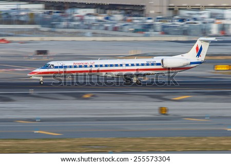 NEW YORK - NOVEMBER 3: Embraer American Eagle Airlines lands at JFK ...