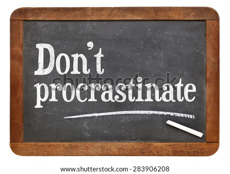 Vintage slate blackboard with the advice 'Do not procrastinate'