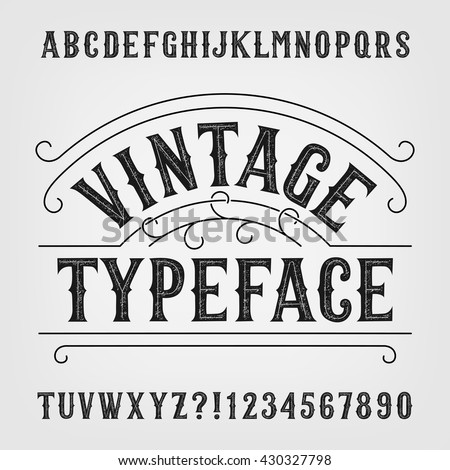 Vintage typeface. Retro distressed alphabet vector font. Hand drawn letters and numbers. Vintage vector font for labels, headlines, posters etc. - stock vector Vintage typeface. Retro distressed alphabet vector font. Hand drawn letters and numbers. Vintage vector font for labels, headlines, posters etc. - stock vector