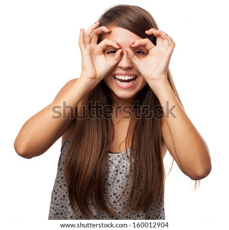 stock-photo-young-girl-doing-glasses-ges