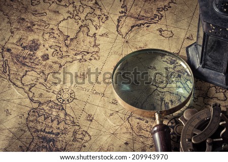 stock-photo-magnifier-with-lantern-with-...943970.jpg