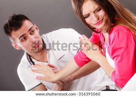 stock photo husband apologizing wife asking woman forgivness boyfriend trying convince girlfriend stock photo husband apologizing wife asking woman forgivness boyfriend trying convince girlfriend