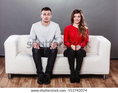 http://thumb1.shutterstock.com/display_pic_with_logo/175351/553742074/stock-photo-shy-woman-and-man-sitting-on-sofa-couch-next-each-other-first-date-pretty-girl-and-handsome-guy-553742074.jpg