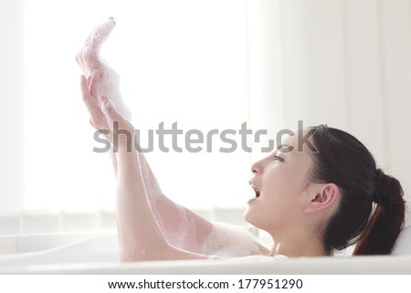 Asian Woman Washing Bathtub 17