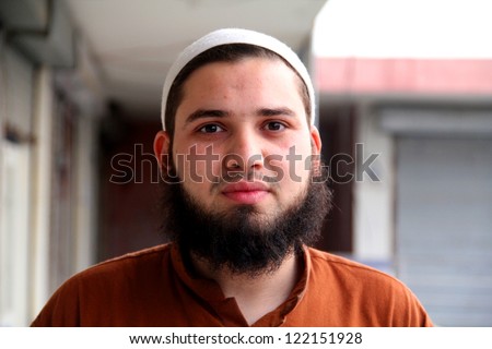 stock-photo-bearded-south-asian-male-adu