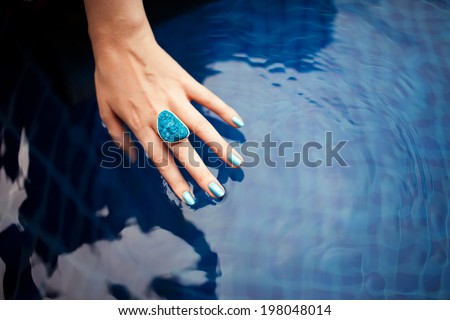 Color woman pool. lower touching yoga back matching image near  water  acute  hand Tender of poses for pain