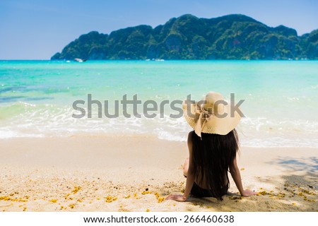 unusual shaved designs sitting on beach nude