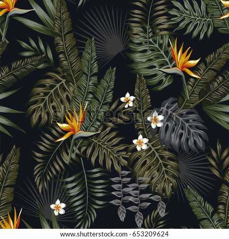 Tropical leaves and flowers in the night style for men's prints. Seamless vector jungle wallpaper pattern black background Tropical leaves and flowers in the night style for men's prints. Seamless vector jungle wallpaper pattern black background