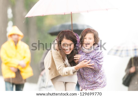 stock-photo-happy-mother-and-daughter-walking-in-park-smiling-parent-and-kid-hiding-under-umbrella-laughing-129699770 Why Is Dating A Polish Young lady So Eye-catching?