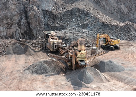 http://thumb1.shutterstock.com/display_pic_with_logo/2733667/230451178/stock-photo-stone-crusher-in-surface-mine-quarry-230451178.jpg