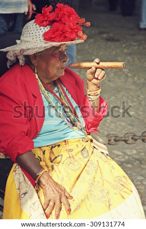 Old Cigar Smoking Woman Wrinkled Stock Photos, Images, & Pictures ...