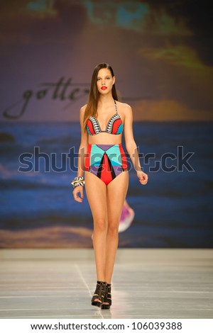  - stock-photo-canary-islands-june-laura-medina-montesdeoca-walk-the-runway-in-the-gottex-collection-during-106039388