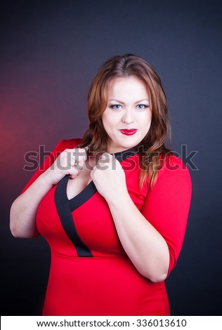 stock photo portrait of a beautiful buxom girl large size in a red dress 336013610