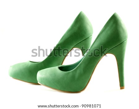 Green high heels pump shoes - stock photo