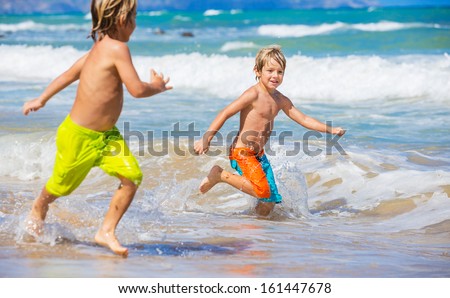 Two young boys having fun on tr...
