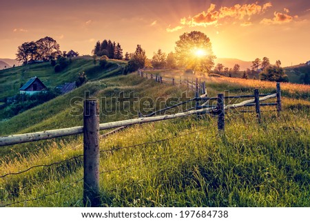 Fantastic morning countryside landscape. Colorful sky. Carpathian, Ukraine, Europe. Beauty world. - stock photo