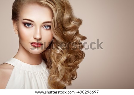 http://thumb1.shutterstock.com/display_pic_with_logo/493354/490296697/stock-photo-fashion-portrait-of-young-beautiful-woman-with-jewelry-and-elegant-hairstyle-blonde-girl-with-long-490296697.jpg