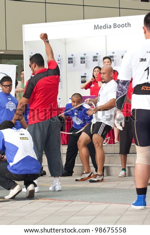  - stock-photo-toa-payoh-singapore-march-contender-for-strongman-sulaiman-ismail-in-the-mazda-cx-car-98675558