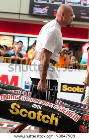  - stock-photo-toa-payoh-singapore-march-contender-for-strongman-sulaiman-ismail-attempts-the-times-98847908