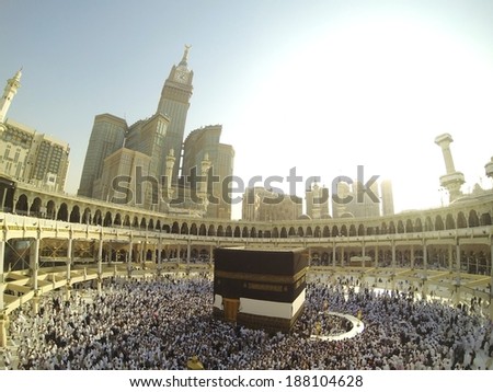 Muslim people praying at Kaaba in Mecca - stock photo