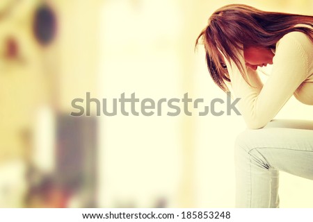  - stock-photo-teenage-girl-depression-lost-love-185853248