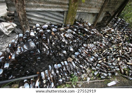 stock-photo-tatopani-nepal-april-pile-of-beer-bottles-a-remainder-of-alcohol-drinking-trekkers-27552919.jpg