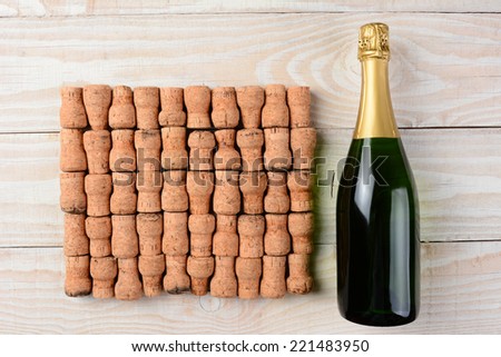 Download High angle shot of a bottle of champagne laying next to a ... Yellowimages Mockups