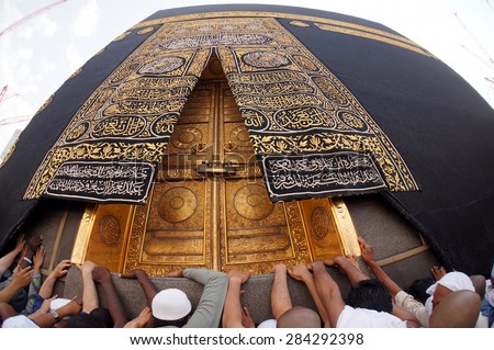 MECCA, SAUDI ARABIA-CIRCA MAY 2015: A close up view of Kaaba door at Masjidil Haram on MAY, 2015 in Makkah, Saudi Arabia. The door is made of pure gold. - stock photo