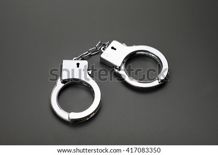 Handcuffs Stock Images, Royalty-Free Images & Vectors | Shutterstock