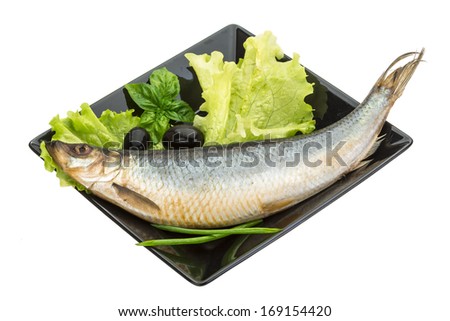 shrimps herring salad with onion and marinated artichoke hearts salad