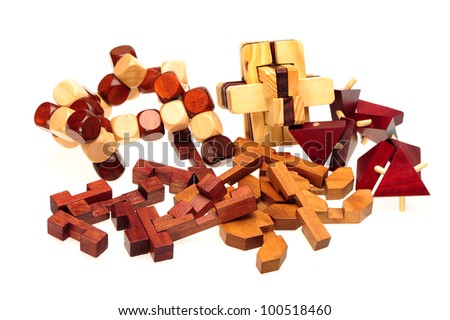 wooden puzzle over white background - stock photo