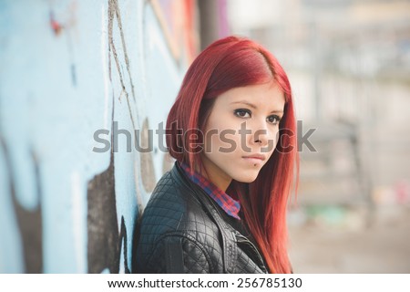 http://thumb1.shutterstock.com/display_pic_with_logo/598642/256785130/stock-photo-young-beautiful-red-hair-venezuelan-woman-lifestyle-in-the-city-of-milan-outdoor-street-256785130.jpg