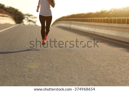 barefoot running on road