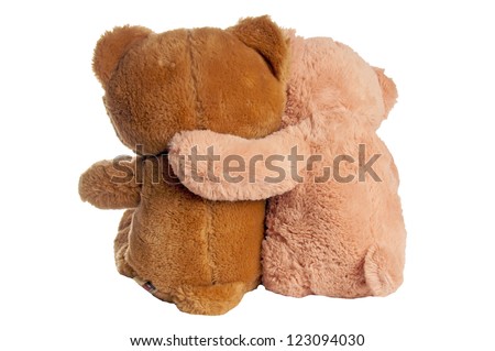 two teddy bears hugging