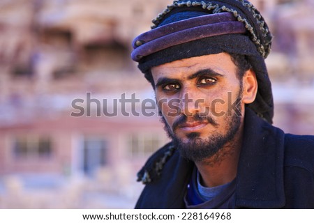 stock-photo-a-bedouin-man-in-petra-jordan-228164968.jpg