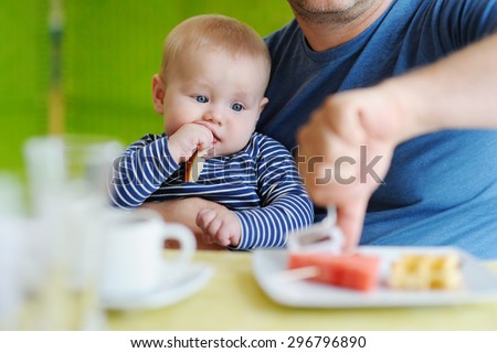 http://thumb1.shutterstock.com/display_pic_with_logo/702733/296796890/stock-photo-portrait-of-little-baby-boy-eating-piece-of-bread-296796890.jpg