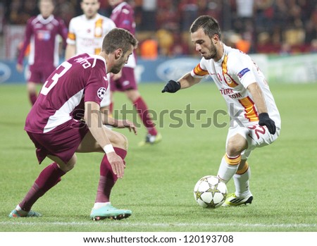  - stock-photo-cluj-napoca-romania-november-ivo-pinto-and-emre-colak-in-uefa-champions-league-match-between-120193708