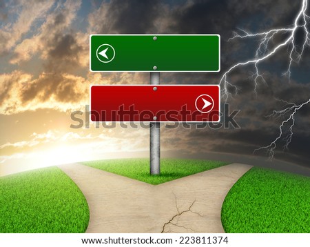 ... Green grass, fork in the way and lightning as backdrop - stock photo