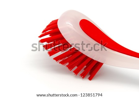  - stock-photo-red-cleaning-brush-on-white-background-123851794
