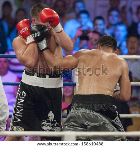  - stock-photo-galati-romania-august-cristian-ciocan-hammer-r-and-leif-larsson-l-fight-at-the-wbo-158610488