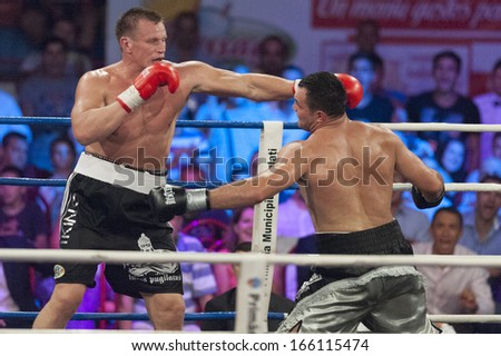  - stock-photo-galati-romania-august-cristian-ciocan-hammer-r-and-leif-larsson-l-fight-at-the-wbo-166115474
