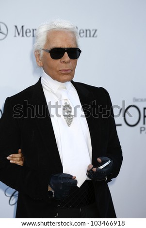  - stock-photo-antibes-may-karl-lagerfeld-at-the-amfar-s-cinema-against-aids-at-hotel-du-cap-on-may-103466918