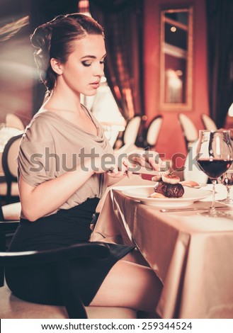 stock photo beautiful young woman eating alone in a restaurant 259344524 Finding a Foreign Bride